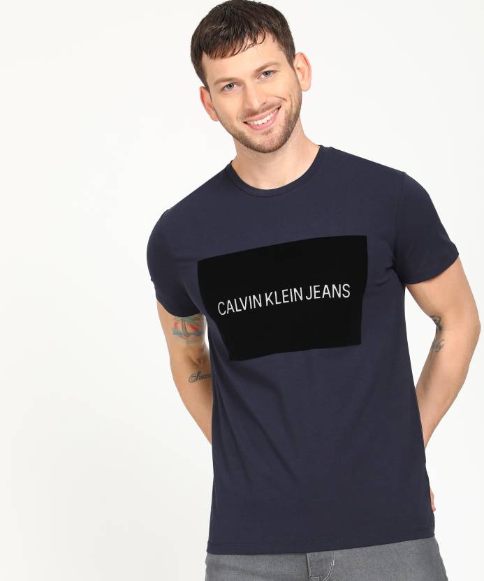 Calvin Klein Jeans Solid Men Round Neck Dark Blue T-Shirt - Buy Calvin  Klein Jeans Solid Men Round Neck Dark Blue T-Shirt Online at Best Prices in  India 