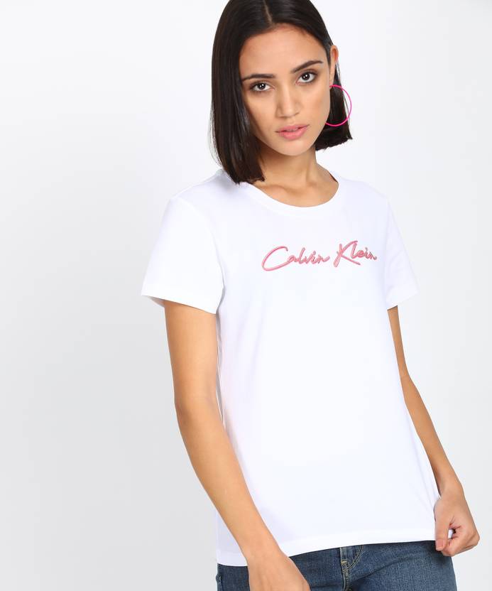 Calvin Klein Jeans Printed Women Round Neck White T-Shirt - Buy Calvin Klein Jeans Printed Women Round Neck White T-Shirt Online at Best Prices in India Calvin Klein Jeans Printed Women Round Neck White T-Shirt - Buy Calvin Klein Jeans Printed Women Round Neck White T-Shirt Online at Best Prices in India