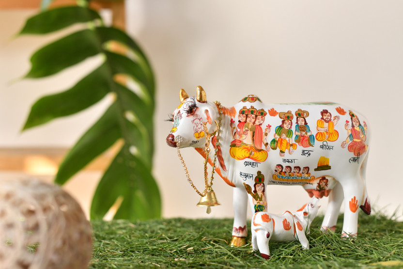 Fashion Bizz Fashion Bizz Kamdhenu Cow Statue with Calf for Home Decor Gifting and Decorative Polyresin (19x7x15cm) Showpiece - 19 cm (Polyresin, White) Decorative Showpiece  -  11 cm(Polyresin, Multicolor)