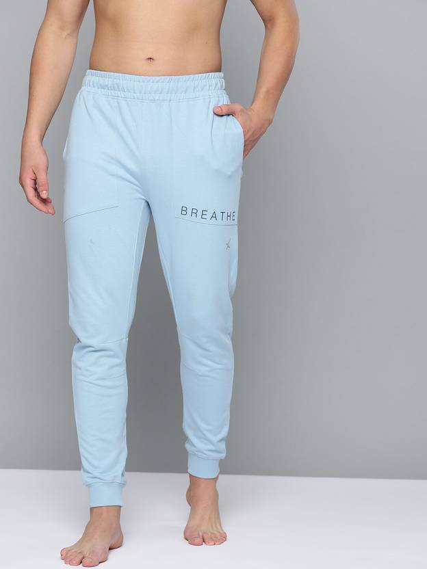HRX by Hrithik Roshan Solid Men Blue Track Pants Buy HRX by Hrithik