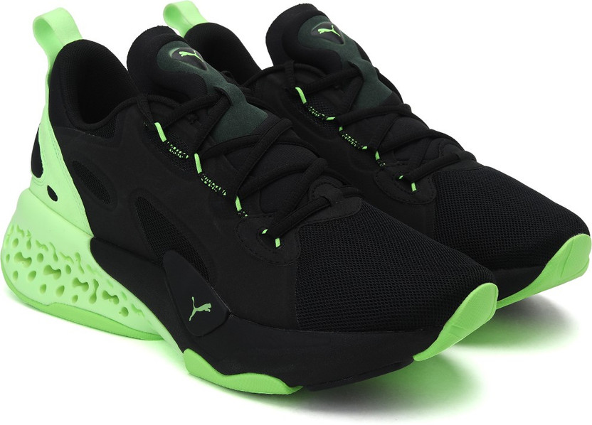 puma black and green shoes