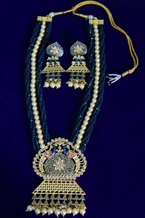 KRISHNA JEWELLERY & GEMS Brass Goldplated Blue Jewellery Set Price in