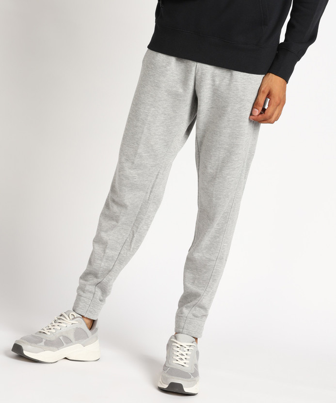 New Balance Solid Men Grey Track Pants 