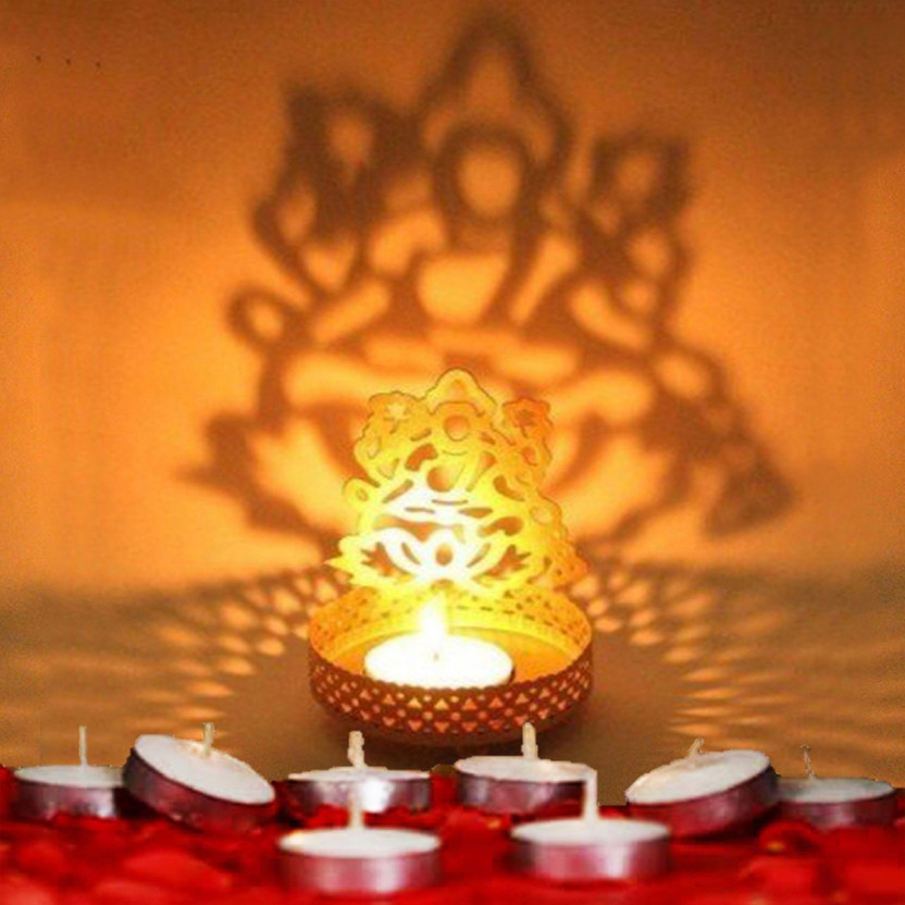 Aseenaa Shadow Laxmi Ji Metal Tea Light Stand With 10 Candles Tealight For Diwali Decoration | God Lakshmi Ji Candle Holder Stands For Home Decor Decorative Items | Size : 8x8x9.5cm | Color : Brown Steel 1 - Cup Candle Holder Set(Brown, Pack of 11)