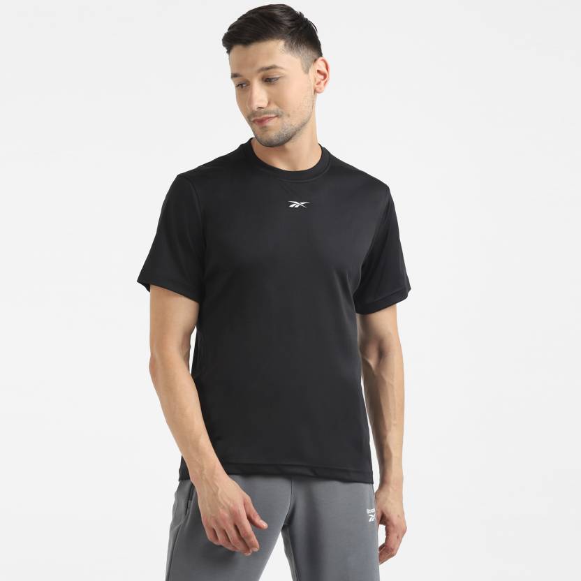 REEBOK FND POLY TEE Solid Men Round Neck T-Shirt Starts from Rs. 282
