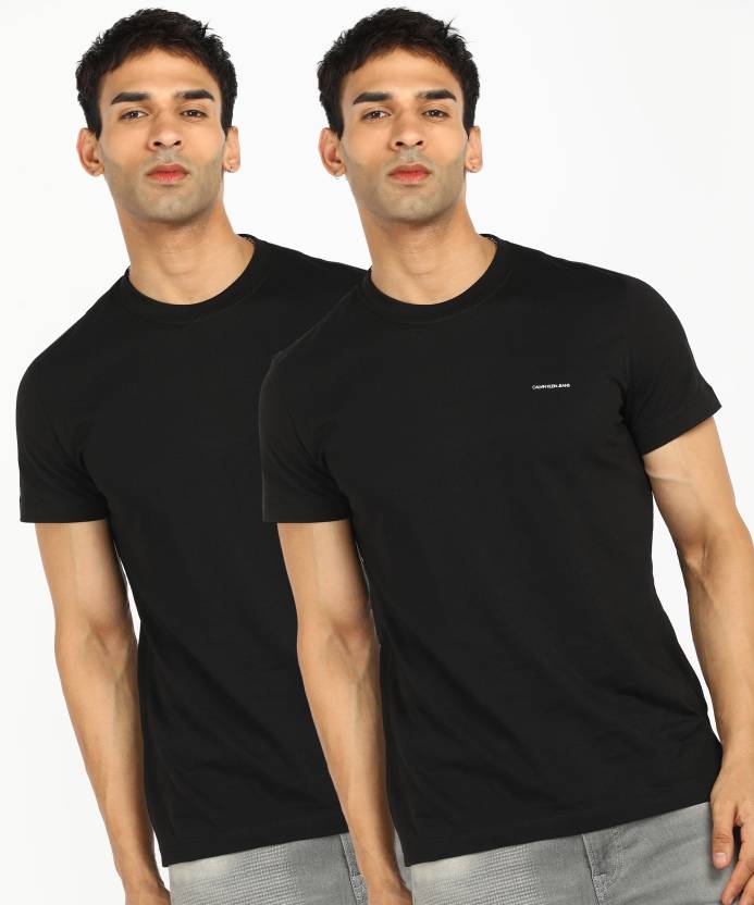 Forbedre kommentar Tropisk Calvin Klein Jeans Solid Men Round Neck Black T-Shirt - Buy Calvin Klein  Jeans Solid Men Round Neck Black T-Shirt Online at Best Prices in India |  Flipkart.com