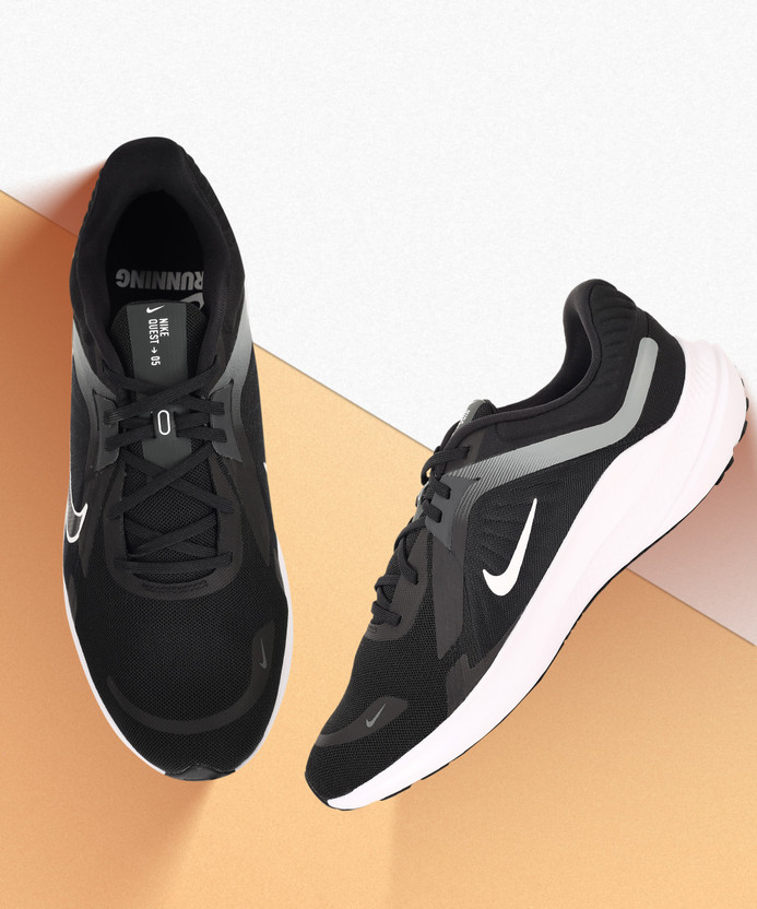 nike running quest trainers in black & white