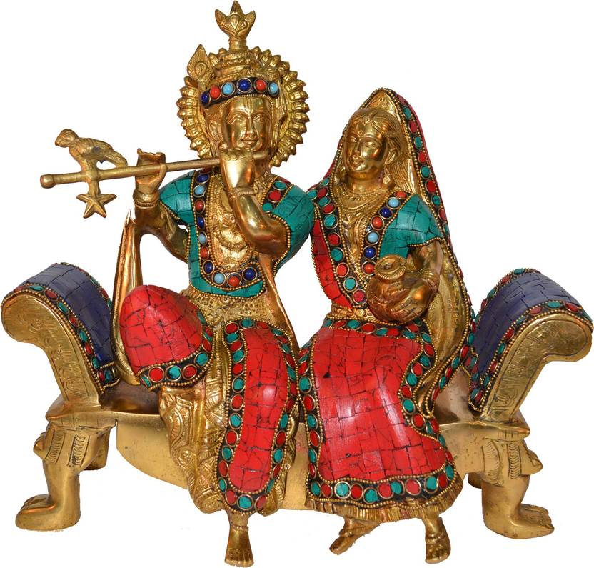 Aakrati Radha Krishna Sitting On A Sofa Set With Turquoise Work