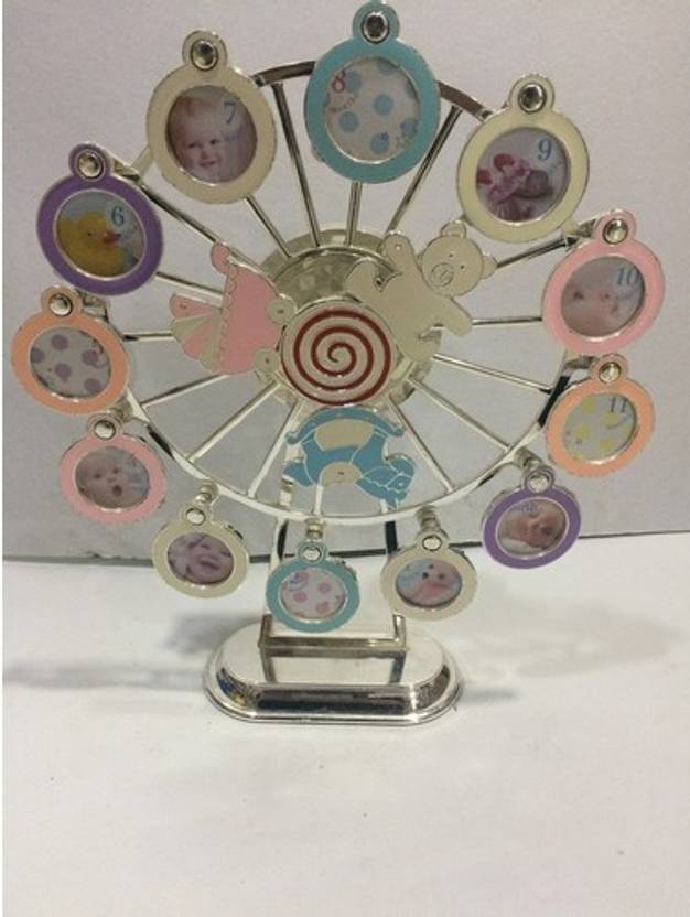 Jades Merry Go Round Type Photo Frame Decorative Showpiece 9 Cm Jades Merry Go Round Type Photo Frame Decorative Showpiece 9 Cm Stainless Steel Silver