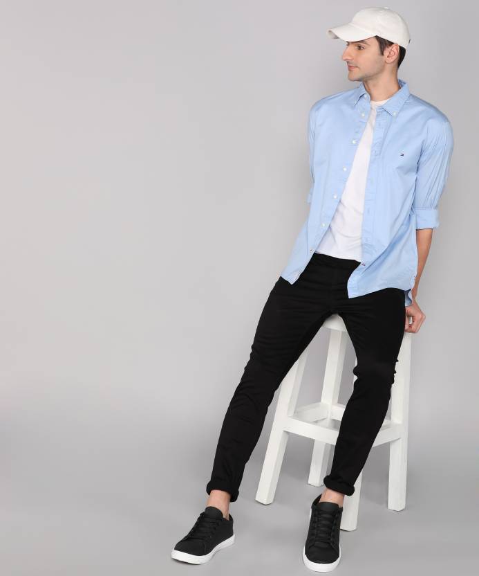 Light blue shirt with black pant outfit combination