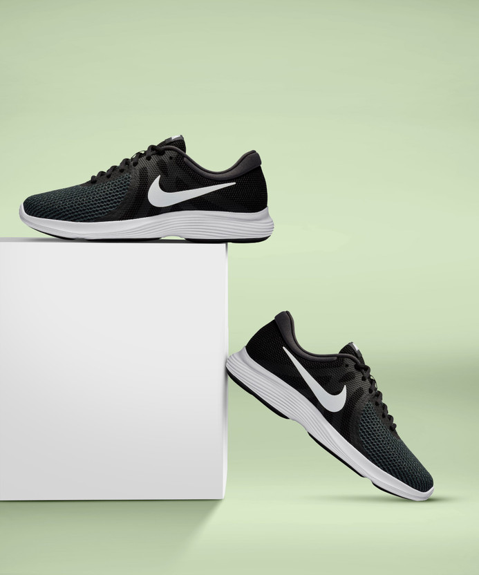 nike revolution 4 green black