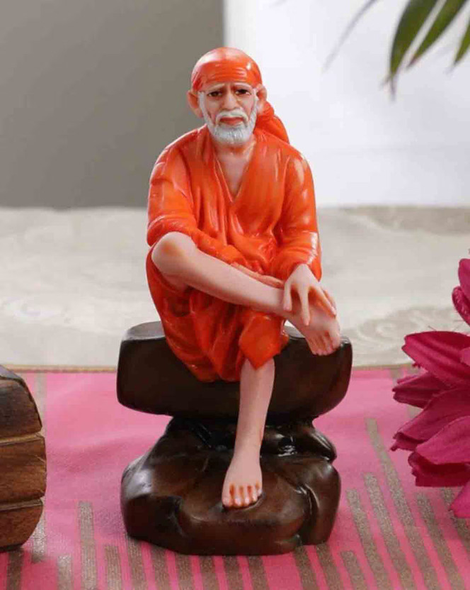 Divine Creations Shirdi Sai Baba Statue - Ideal for Blessing Your Home, Pooja Room, & Workspace - Decorative Showpiece  -  12 cm(Polyresin, Orange)