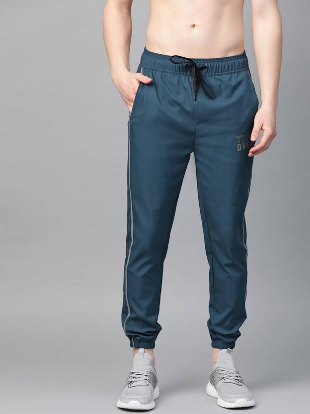 HRX by Hrithik Roshan Solid Men Blue Track Pants Buy HRX by Hrithik