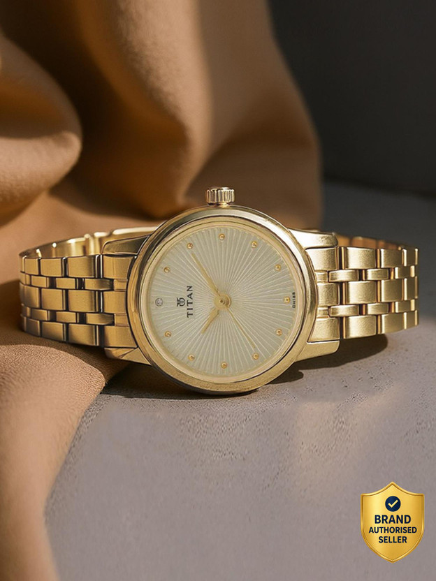 Titan NP2593YM01 Titan Karishma Champagne Dial Golden Stainless Steel Strap Analog Watch  - For Women