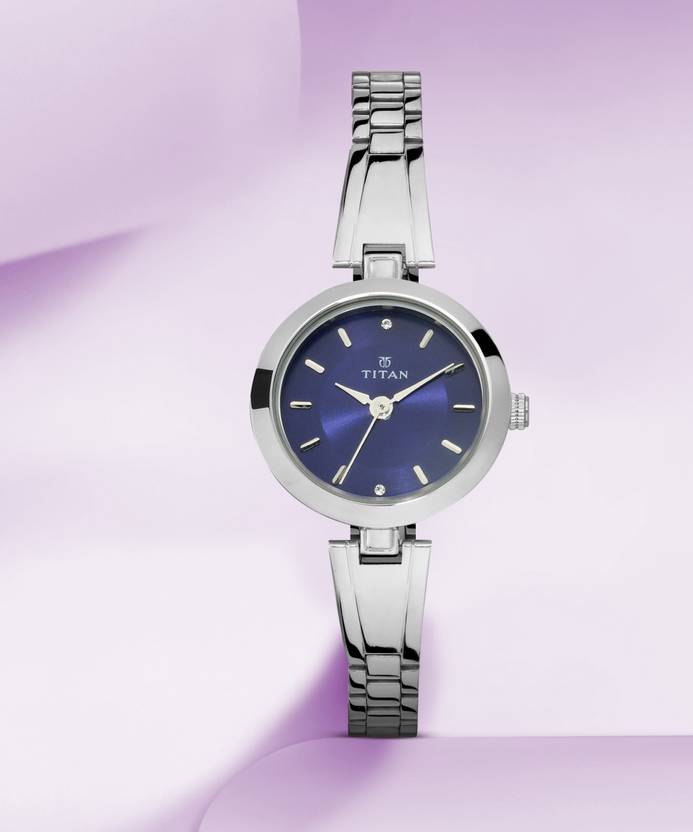 Titan Titan Karishma Blue Dial Silver Stainless Steel Strap Analog Watch - For Women NS2598SM04,NU2598SM04