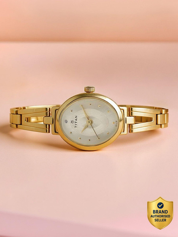 Titan 2594YM01 Titan Karishma Champagne Dial Golden Stainless Steel Strap Analog Watch  - For Women