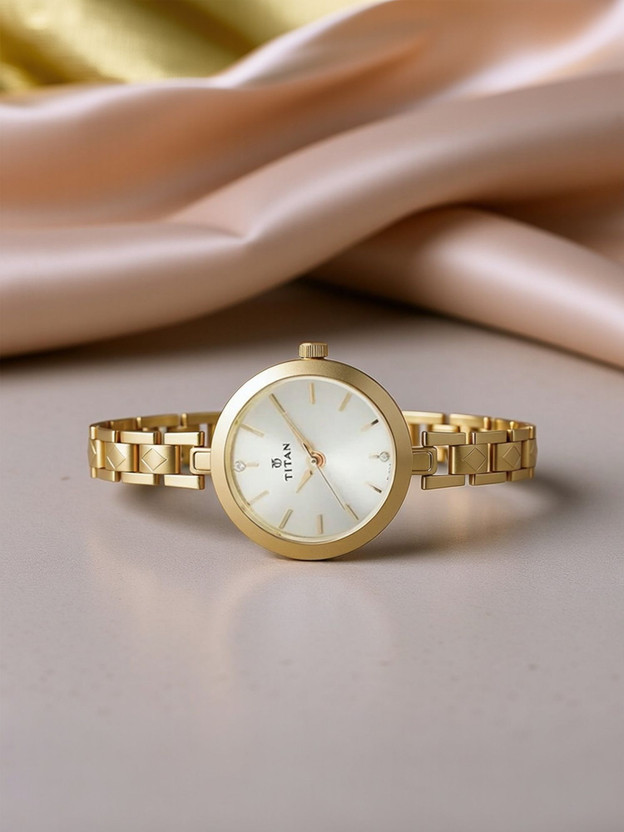 Titan 2598YM01 Titan Karishma Champagne Dial Golden Stainless Steel Strap Analog Watch  - For Women