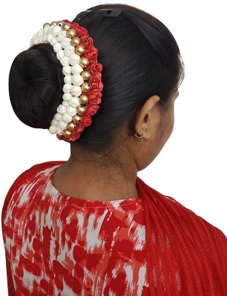 Traditional Indian bridal hairstyle  Bun hairstyles Indian bridal  hairstyles Celebrity hair stylist