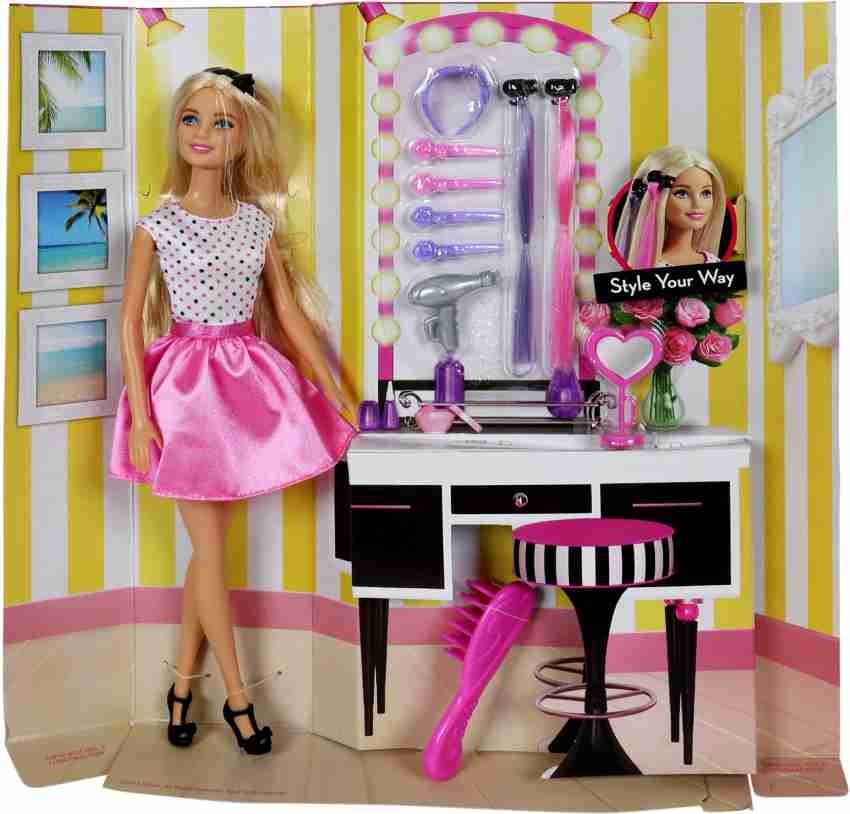 barbie doll with hair accessory