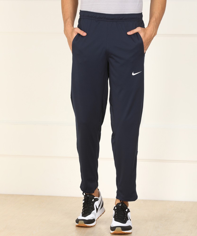 Nike joggers/track pants in navy blue, Men's Fashion, Bottoms, Trousers on  Carousell