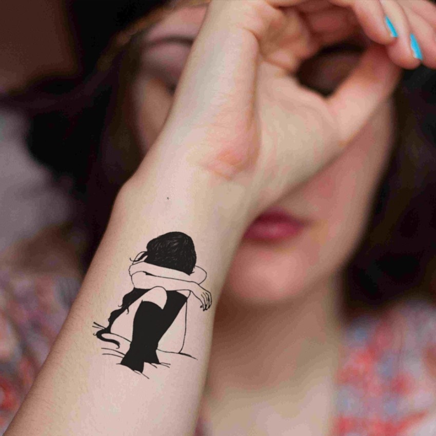 12 Sadness Tattoo Photos  Meanings  Steal Her Style