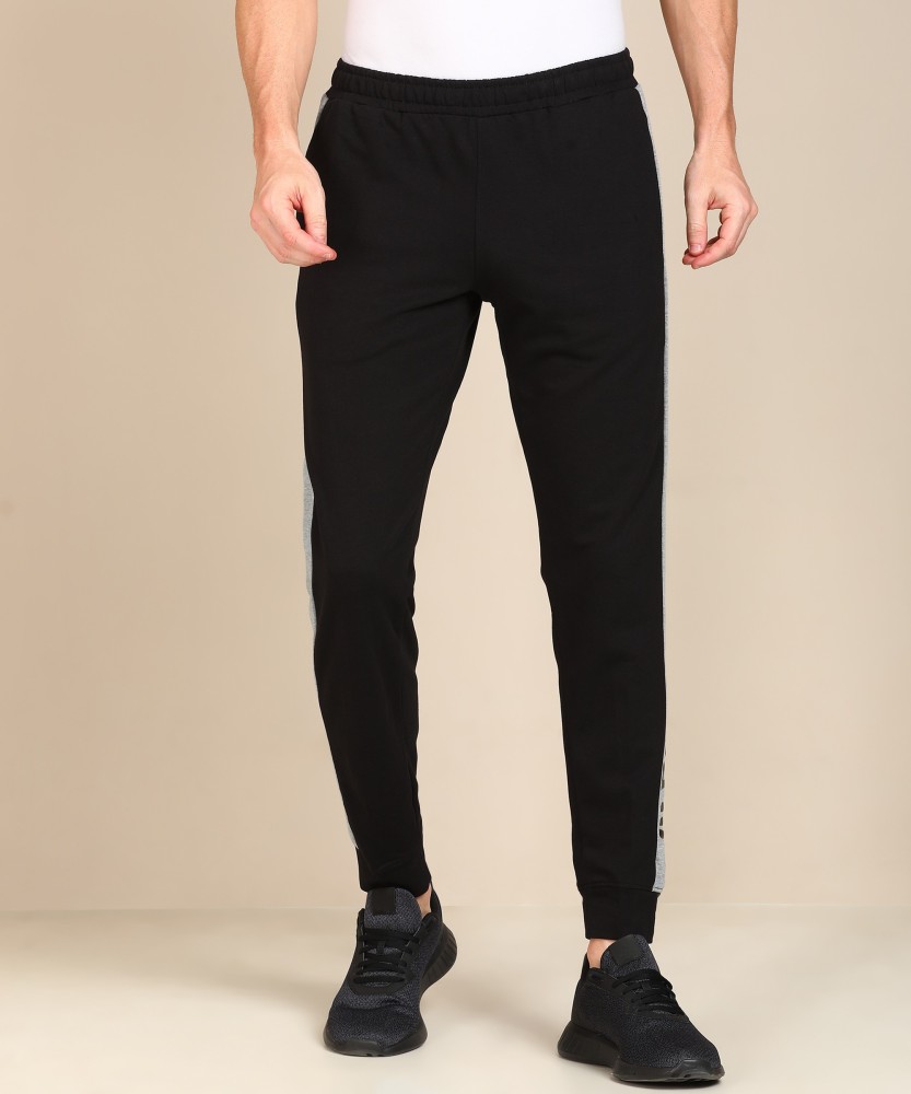 Buy Men Grey Solid Track pants online  Looksgudin