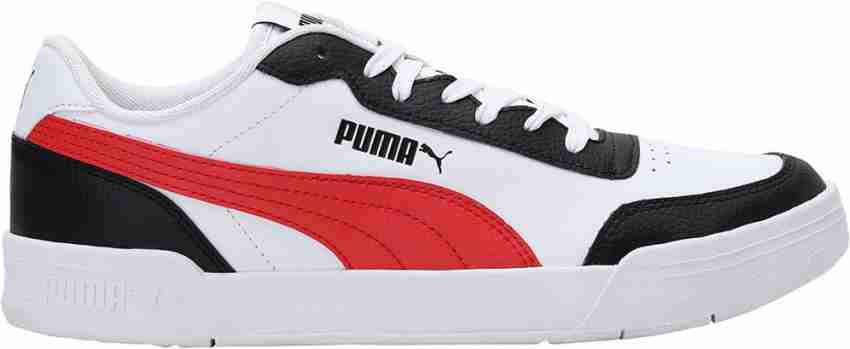 puma white and red sneakers