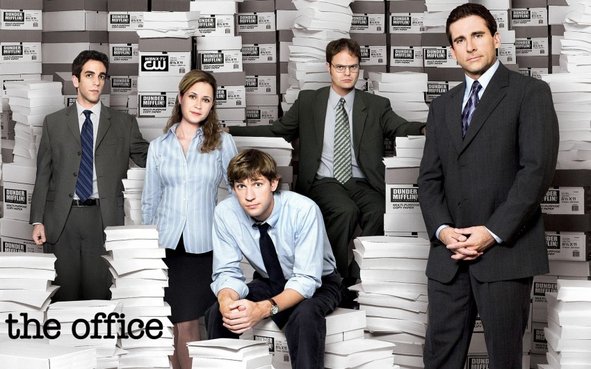 Download The Office cast at Dunder Mifflin's reception desk Wallpaper