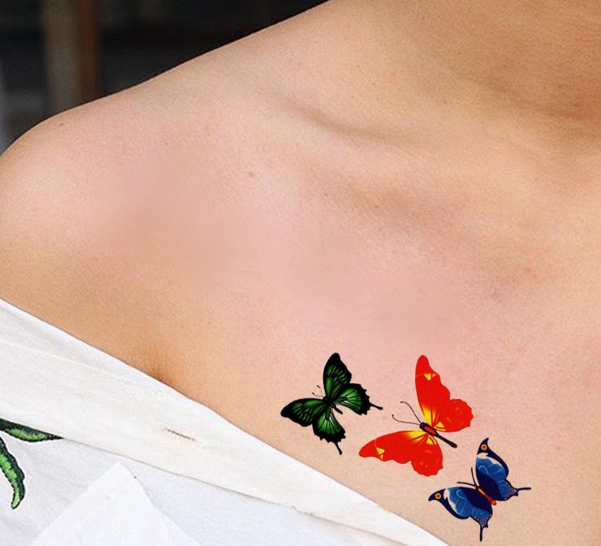 Harry Styles Inks a Big Butterfly on His Chest  E Online