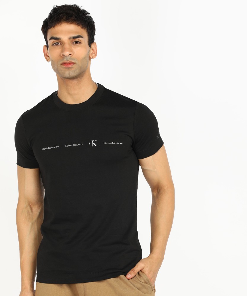 Calvin Klein Jeans Solid Men Crew Neck Black T-Shirt - Buy Calvin Klein  Jeans Solid Men Crew Neck Black T-Shirt Online at Best Prices in India |  