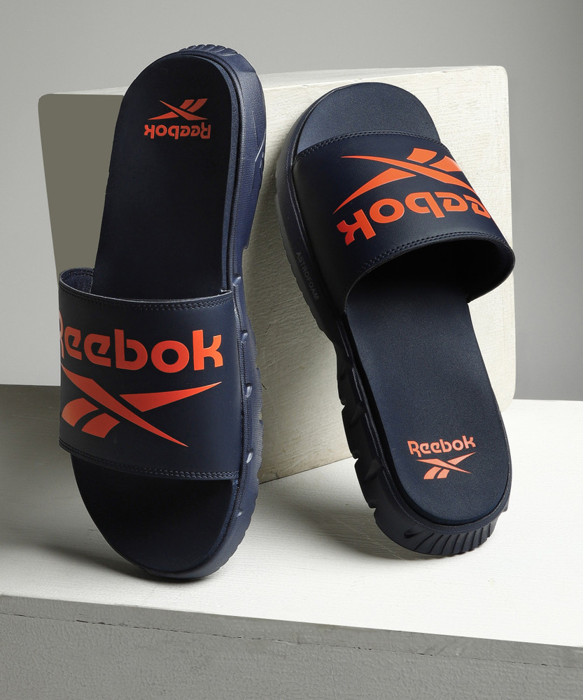 reebok printed vector slides