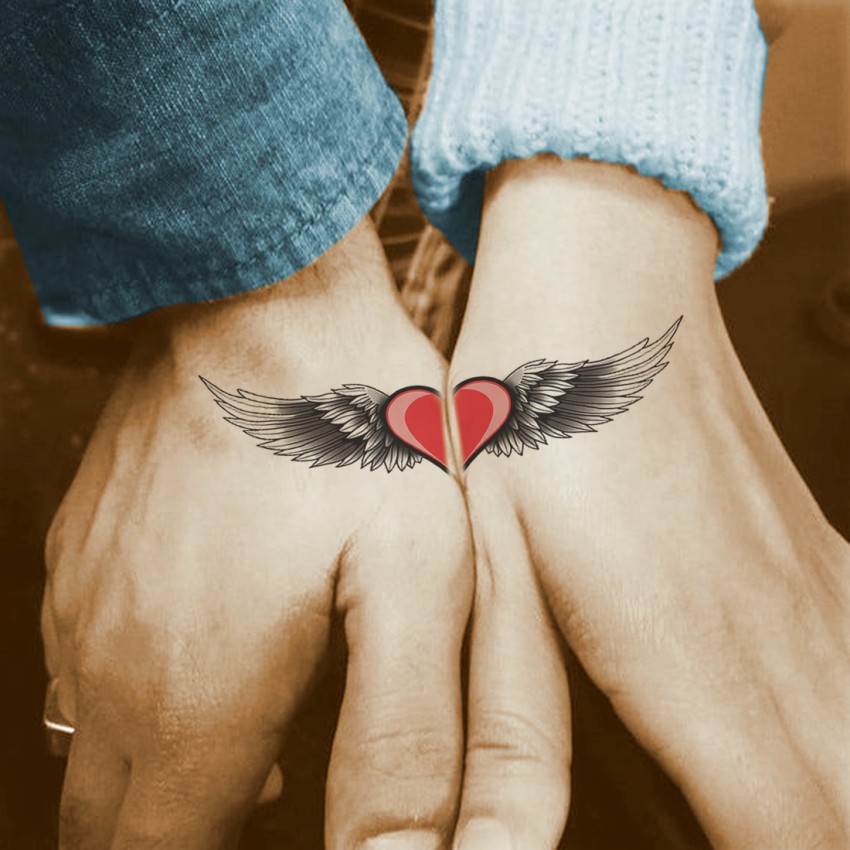 heart with wings tattoo 16767314 Vector Art at Vecteezy