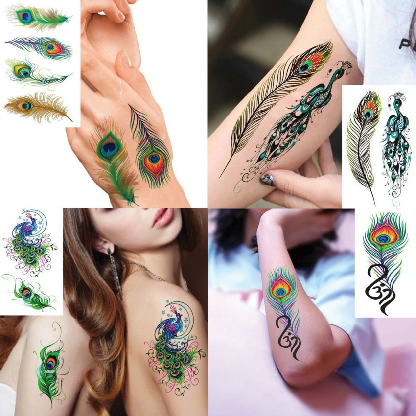 Peacock feather tattoo on the right middle finger