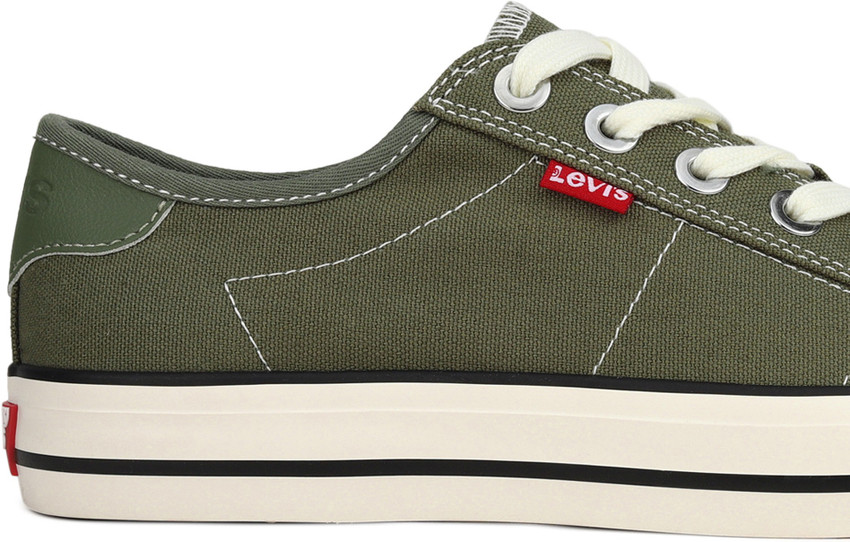 green levi shoes