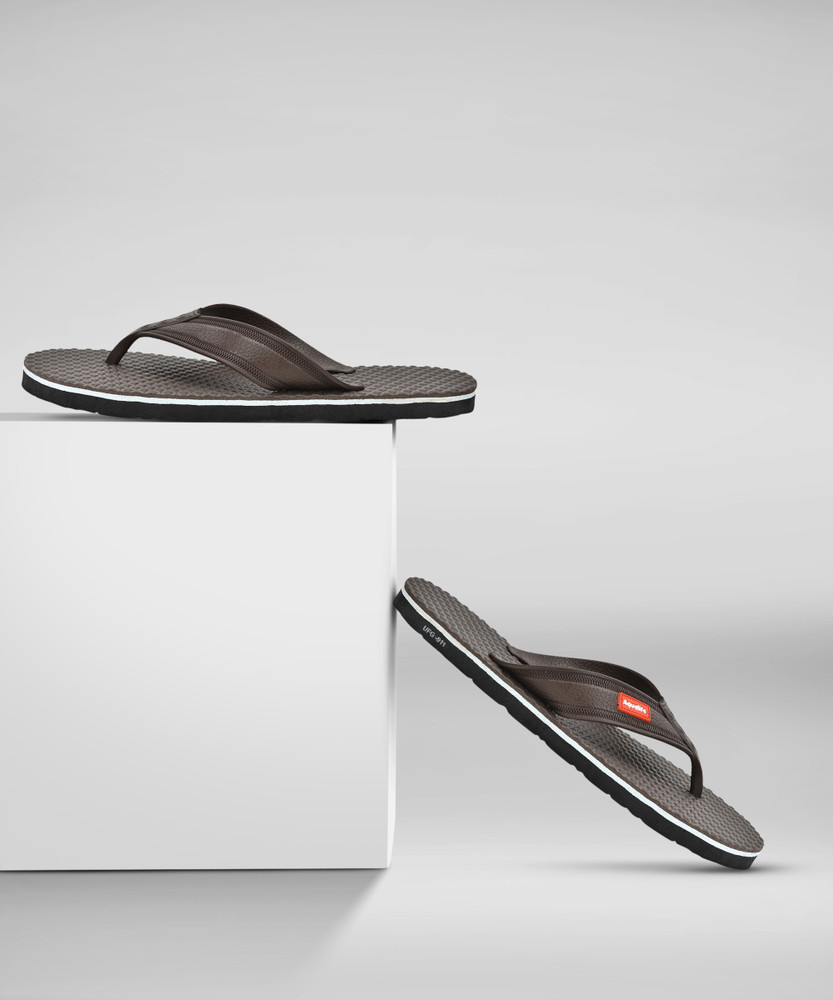 nike gold and black slides