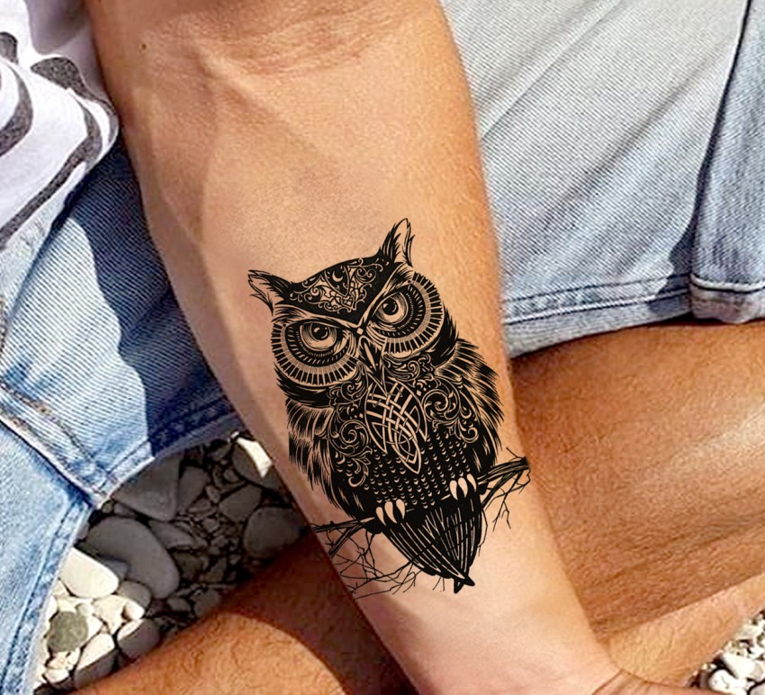 owl tattoos on wrist