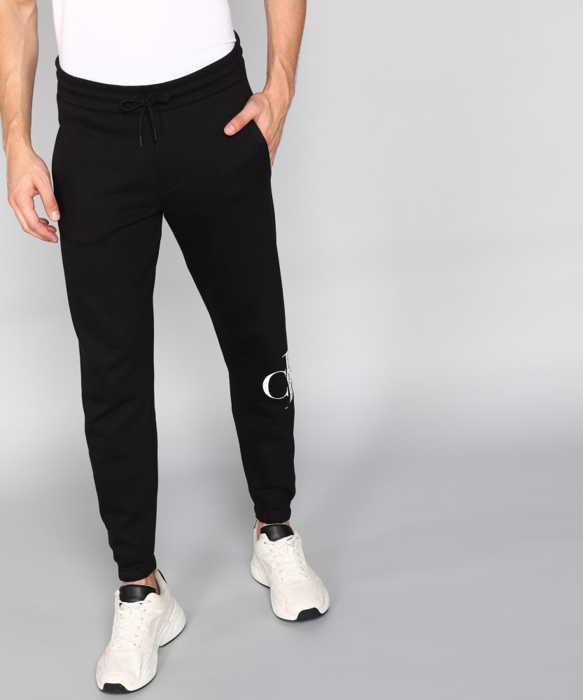 Buy Calvin Klein Men Green Mid Rise Drawstring Waist Brand Tape Track Pants   NNNOWcom