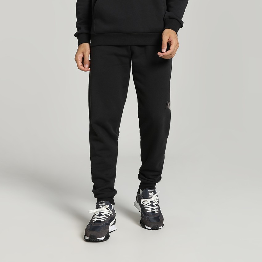 PUMA Solid Men Black Track Pants - Buy PUMA Solid Men Black Track