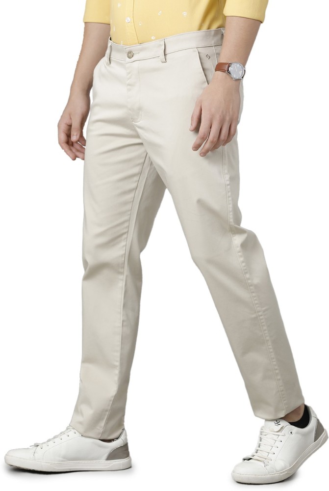 CloseUp Shot of a Man in White Polo Shirt and Khaki Pants  Free Stock  Photo