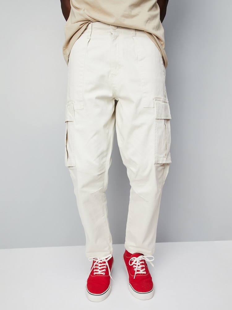 Buy Men Solid Carrot Fit Casual Trousers from Max at just INR 12990