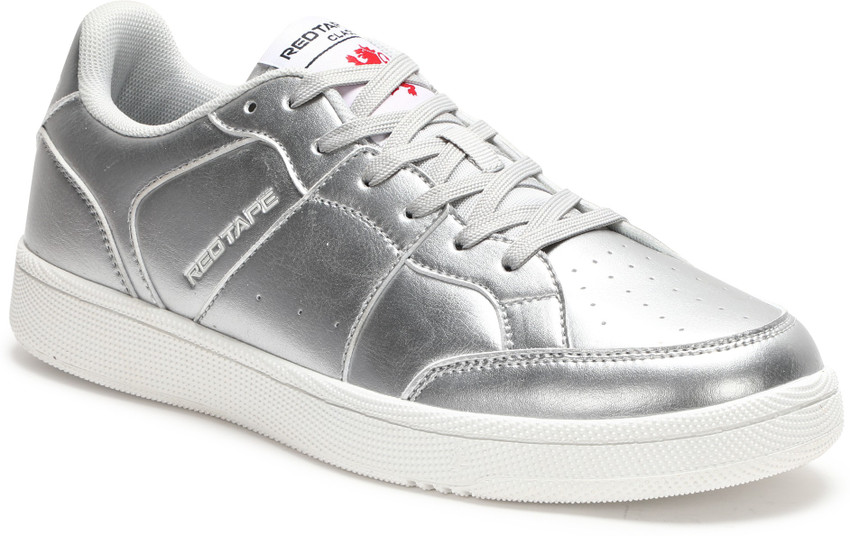 Red tape silver shoes