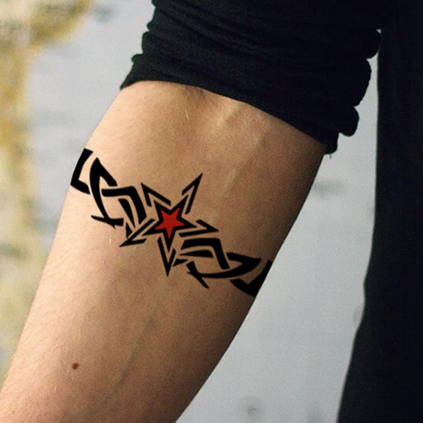 New tattoo on mans arm stock photo  OFFSET